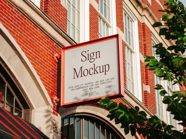 Sign Mockup on Brick Building in Perspective View 1