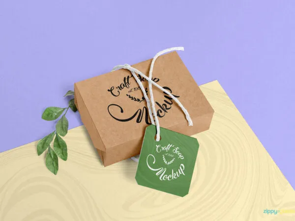 Soap Box with a Tag Laid on a Bifold Background Mockup 1