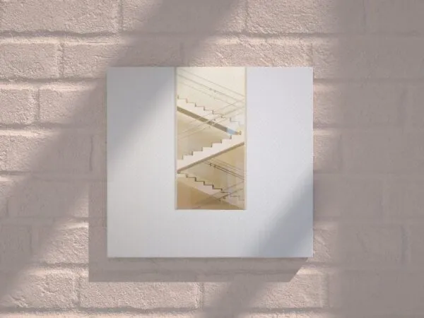 Square Canvas on a Brick Wall Mockup 1