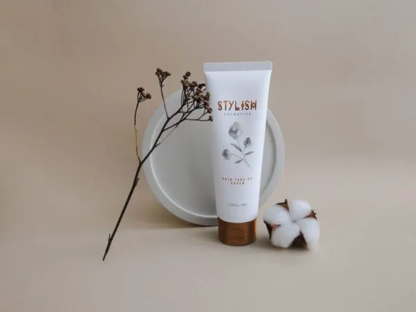 Standing Cream Tube Mockup with Decorative Elements 1