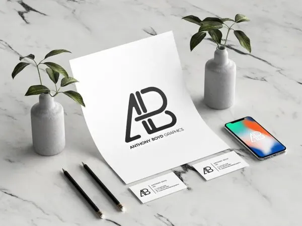 Stationery Mockup Featuring Paper Cards and a Smartphone 1