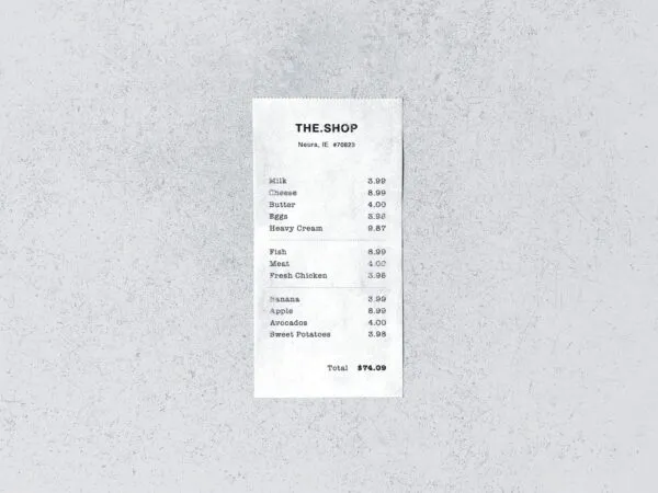 Store Receipt on a Concrete Surface From a Top View Mockup 1
