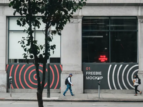 Storefront Wall Mockup Featuring Pedestrian and Trees 1