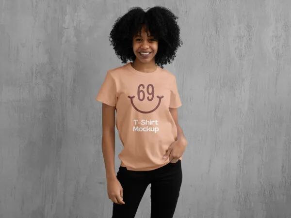 T Shirt Mockup Featuring a Woman in Front of a Wall 1 1