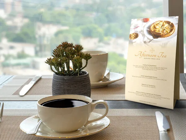 Table Tent Card in a Realistic Environment Mockup 1
