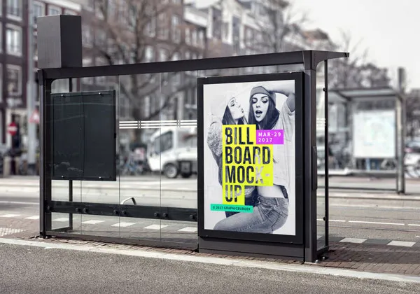 The Vertical Billboard in a Bus Stop with a Blurry Street Background Mockup 1