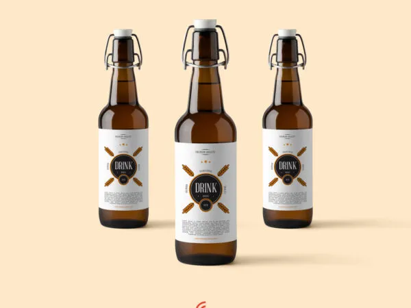 Three Amber Glass Beverage Bottles Mockup 1