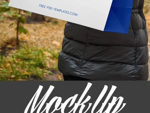 Three Paper Bag with Handle Mockups with an Outdoors Background 1