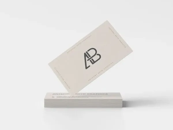 Tilted Business Card Standing on One Edge on a Pack of Cards 1
