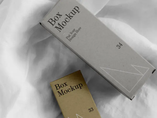 Top View 2 Packaging Boxes on Fabric Mockup 1