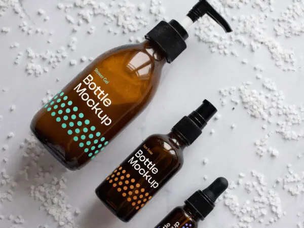 Top View Different Sizes Cosmetics Amber Bottles Mockup 1
