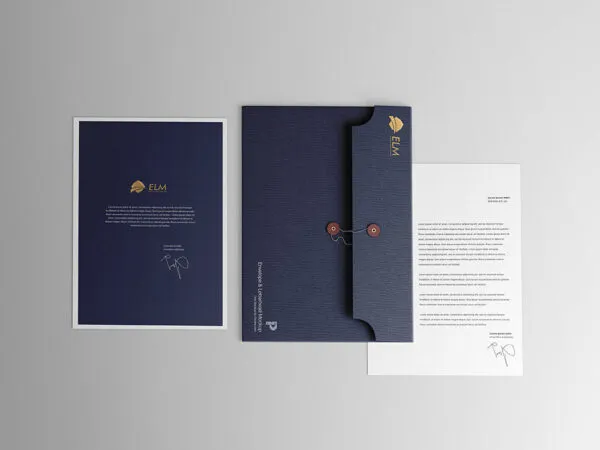 Top View Mockup of Envelope Between Two Letterhead Pages 1