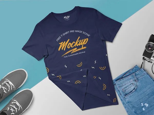 Top View Round Neck T Shirt on a Surface Mockup 1