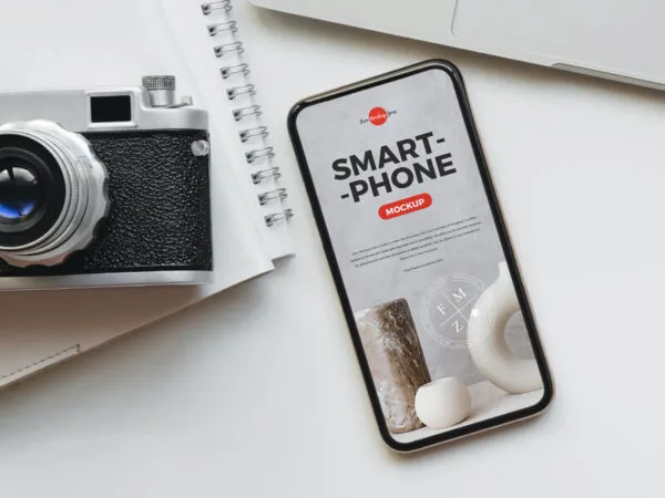 Top View Smartphone Screen Mockup on Desk with a Camera 1