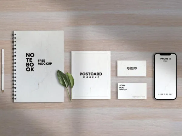 Top View Stationery Mockup Featuring Notebook Cards and iPhone 1