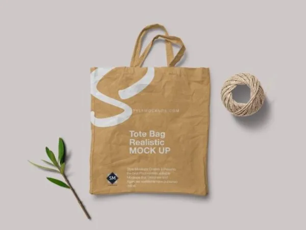 Top View Tote Bag Mockup with Decorative Elements 1