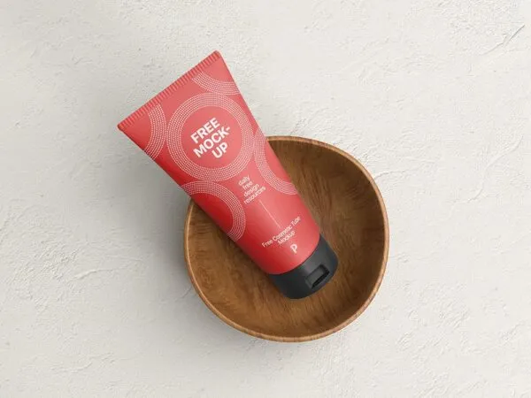Top View of Cosmetic Tube Mockup on a Wooden Cup 1