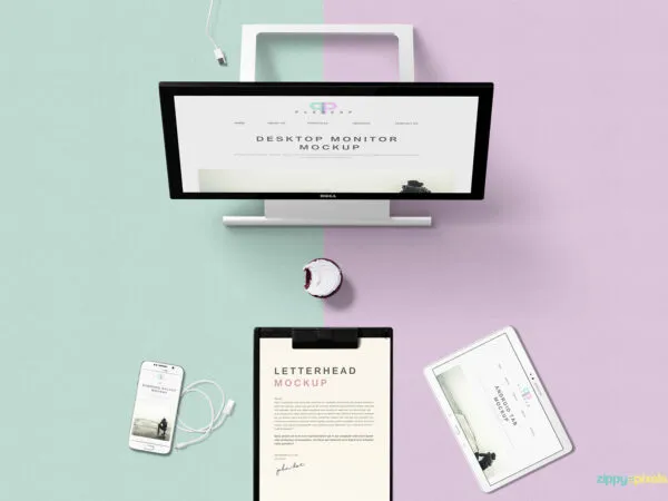 Top View of Desktop Monitor Mockup with Different Electronic Devices 1