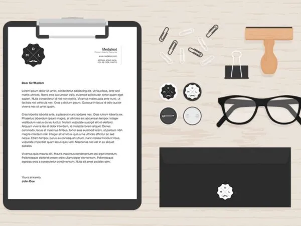 Top View of Flat Stationery Items on a Desk Mockup 1
