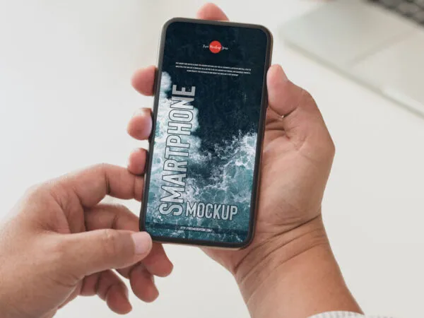 Top View of Hand Holding Smartphone Mockup 1