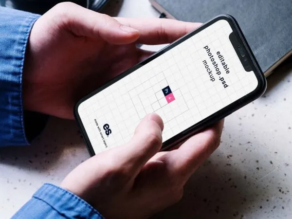 Top View of Handholding Mobile Phone Mockup 1