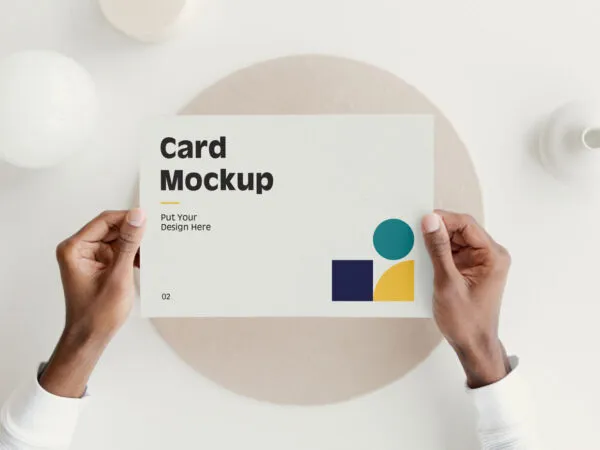 Top View of Hands Holding a Card Mockup 1