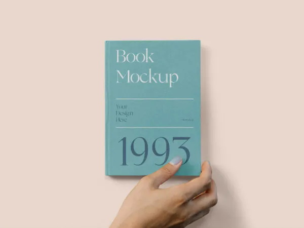 Top View of Hard Cover Book Mockup with Hand 1