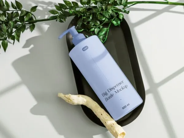 Top View of Realistic Lying Dispenser Bottle Mockup with Plant 1