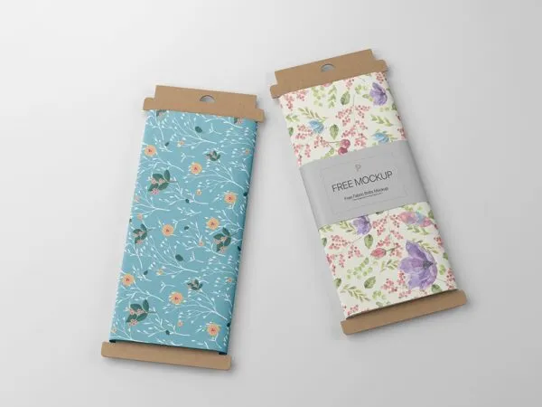 Top View of Two Fabric Bolts Wrapped Around Cardboards Mockup 1
