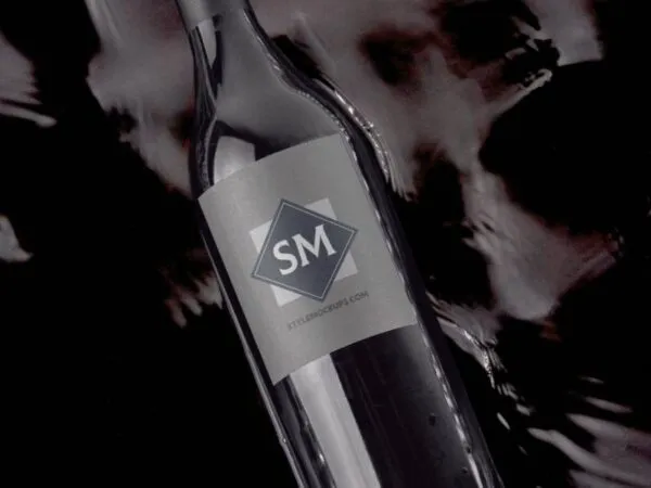 Top View of Wine Bottle Label Mockup in Artistic Setting 1