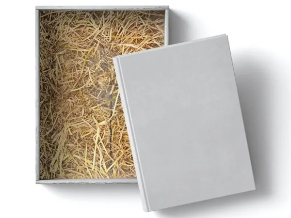 Top View of a Box with Hay and Book Mockup 1