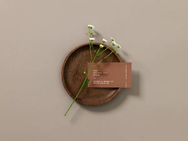 Top View of a Business Card with a Flower Mockup 1