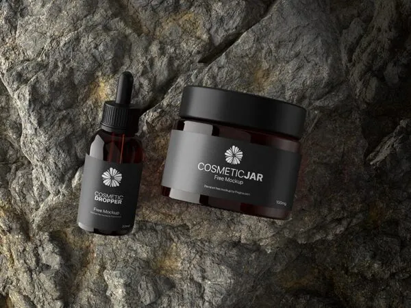 Top View of a Cosmetic Jar and Dropper on a Rock Mockup 1