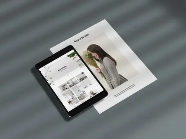 Top View of an iPad With Paper and Overlay Shadow Mockup 1