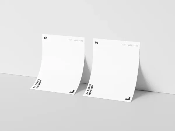 Two A4 Papers Leaned Against Wall Mockup 1