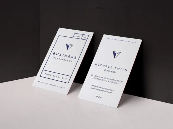 Two Business Card Mockup Laid on The Wall 1