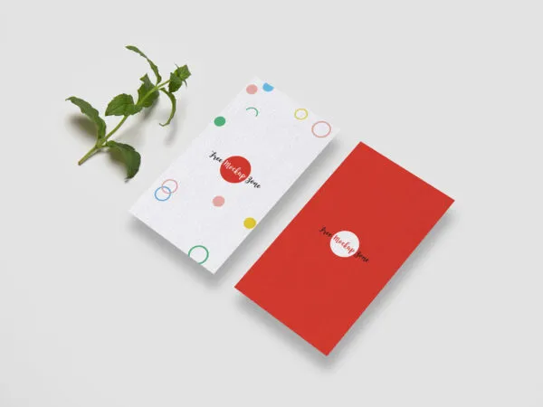 Two Business Cards Laid Vertically in a Perspective View Mockup 1