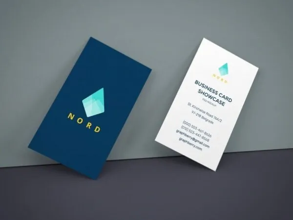 Two Business Cards Leaning Against The Wall Mockup 1