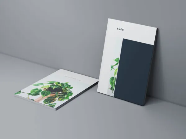 Two Cover Magazine Mockups Next to the Wall 1