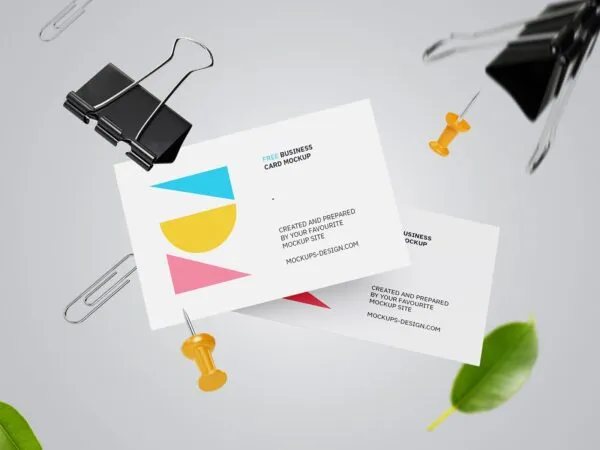 Two Falling Business Card Mockups with Floating Paper Clips 1