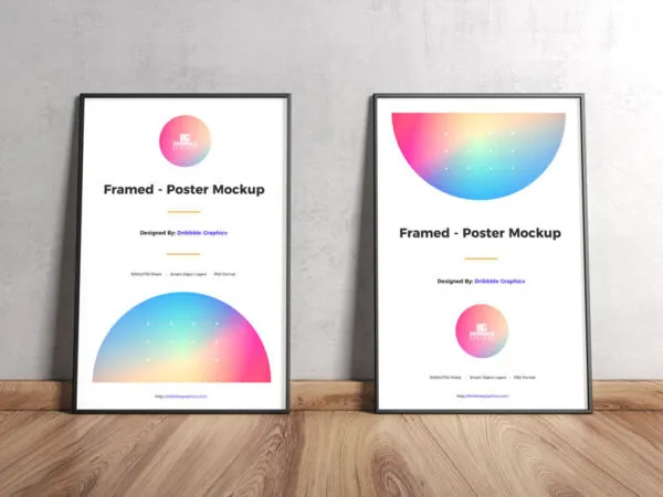 Two Framed Posters on Wooden Floor Leaning Against Wall Mockup 1
