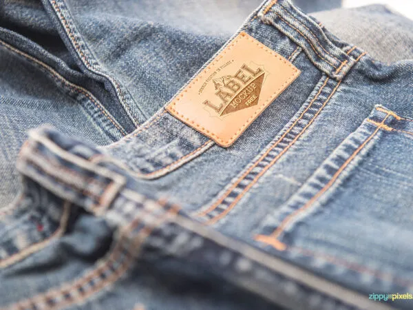 Two Mockups Showing Close up View of Two Clothing Labels 1