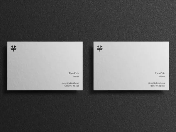 Two Mockups Showing Overhead and Front View of Business Cards 1