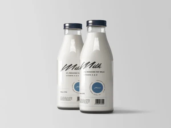 Two Shiny Glass Bottles Filled with Milk Mockup 1