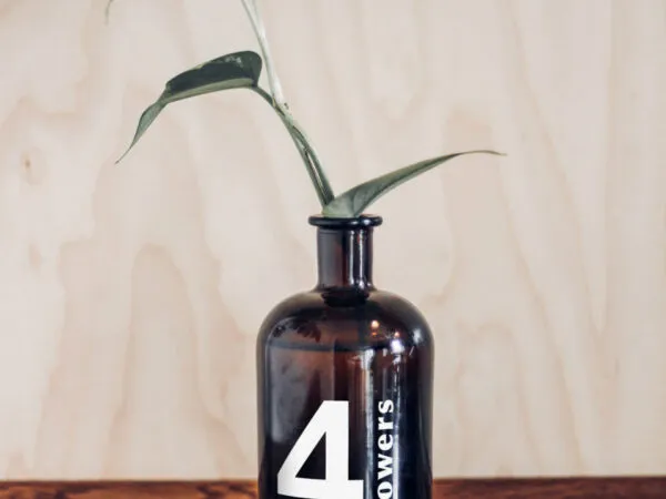 Vase Bottle Mockup on a Wooden Table 1