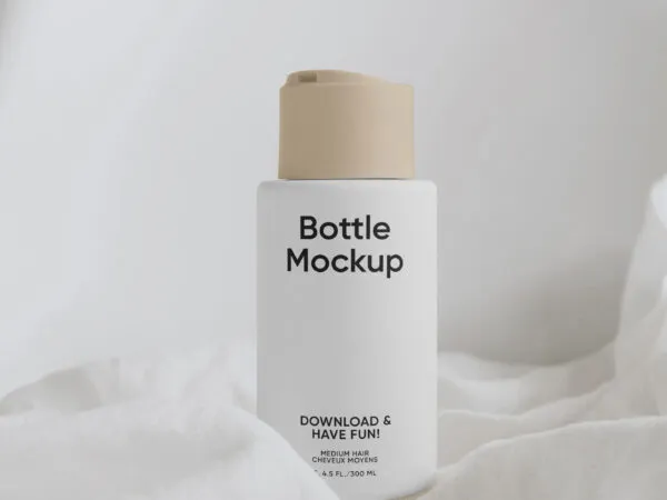 Vertical Cream Bottle on Fabric Mockup 1