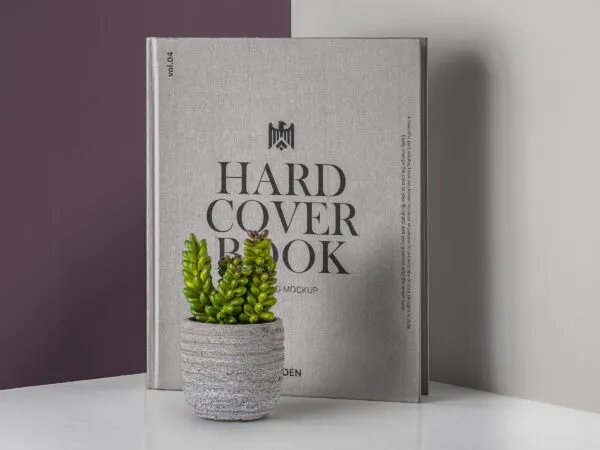 Vertical Hardcover Book Placed Behind a Flowerpot 1