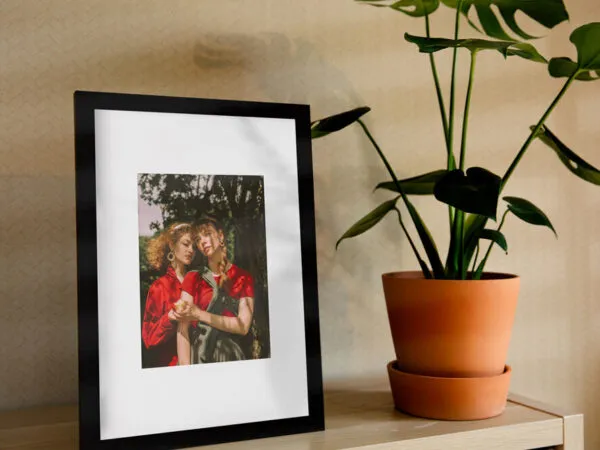 Vertical Photo Frame on a Shelf in the Half Side View Mockup 1