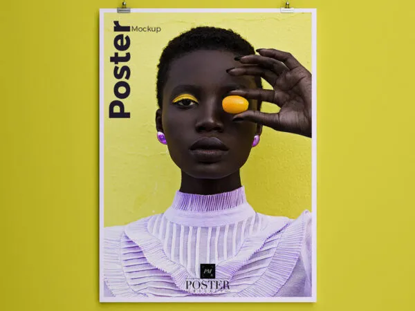 Vertical Poster Hanged Over a Wall by Two Clips Mockup 1
