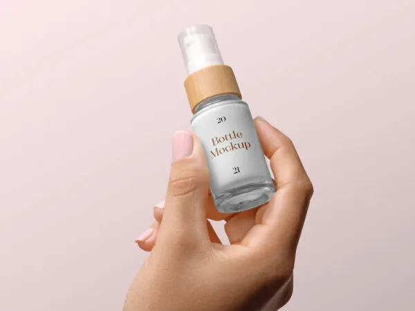 Woman Hand Holding Minimal Cosmetic Bottle Mockup 1